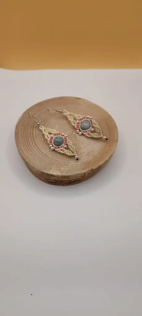 Boucles entrelacs crème et rose